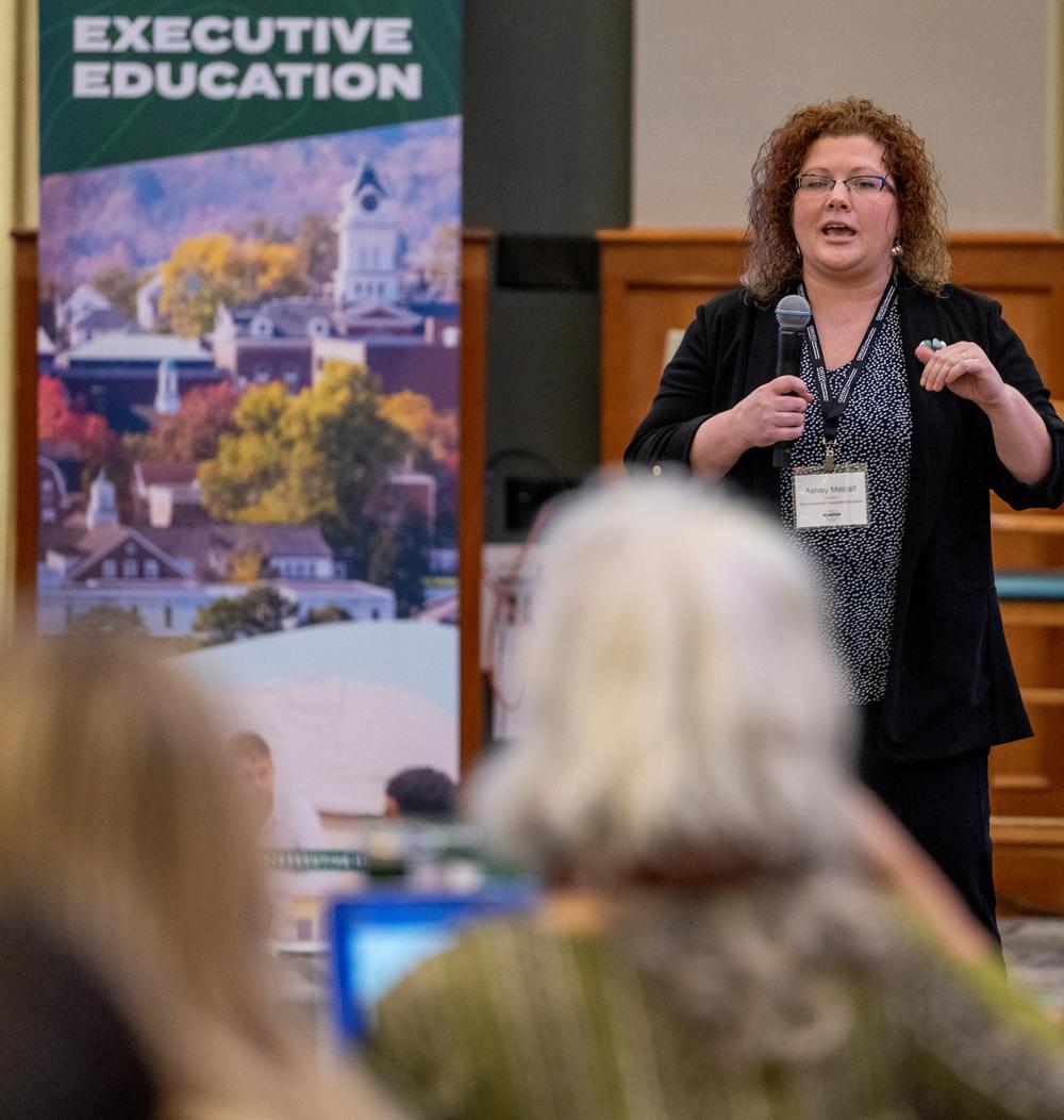 Dr. Ashley Metcalf kicks off the AI workshop for busy professionals