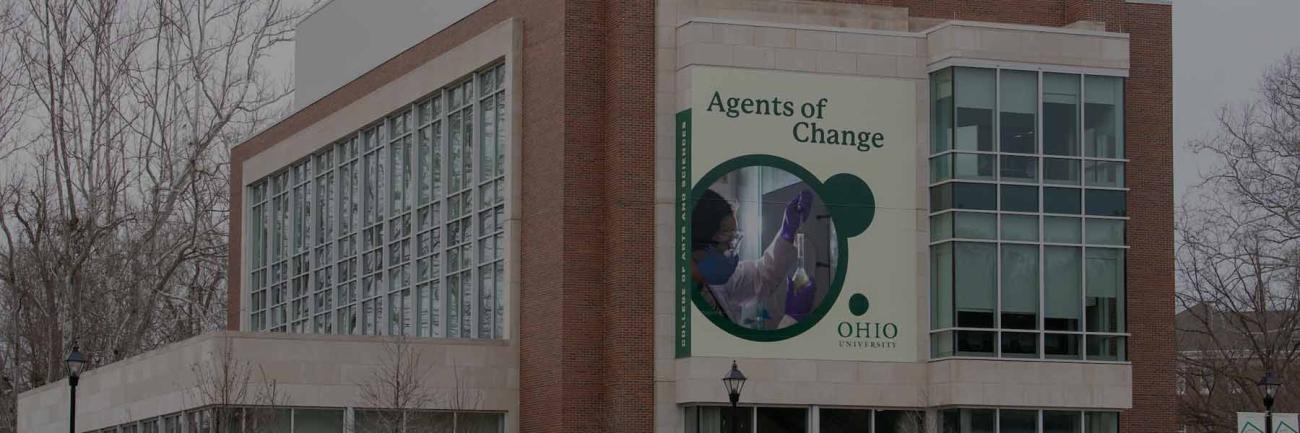Signage on Chemistry Building reads "Agents of Change"