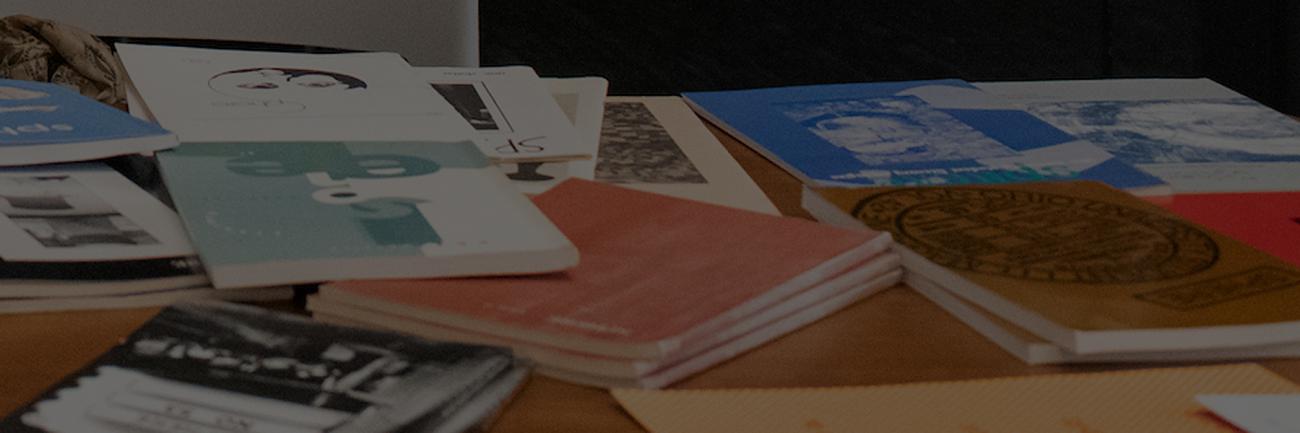 Books atop a table in Ohio University's Ellis Hall