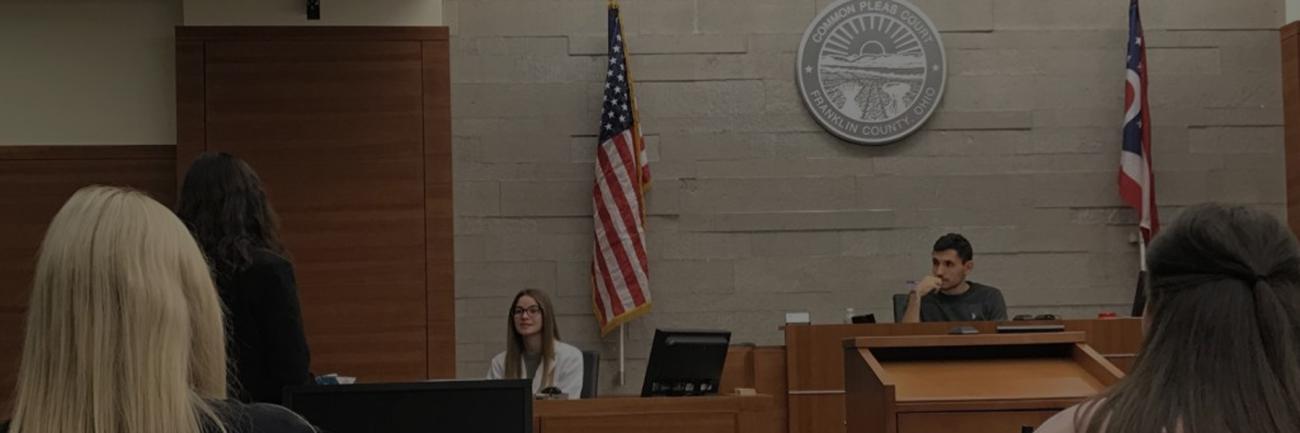 Mock Trial Team practices in a courtroom