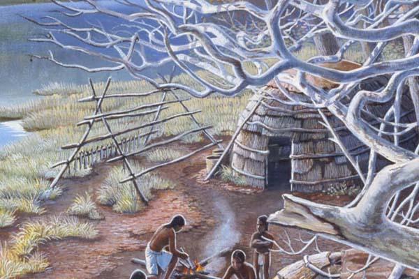 Scene depicting an Archaic base camp along the Maumee River in northwest Ohio where several families band together to prepare for the upcoming winter. Men and women can be seen carving dugout canoes using stone axes, building fires, fishing and grinding nuts for food storage along the bank. The scene is based on archaeological research from Archaic sites including the Dupont, Raisch-Smith, and Weilnau. The size and configuration of the dugout pictured is based a specific find known as the Ringler dugout, di