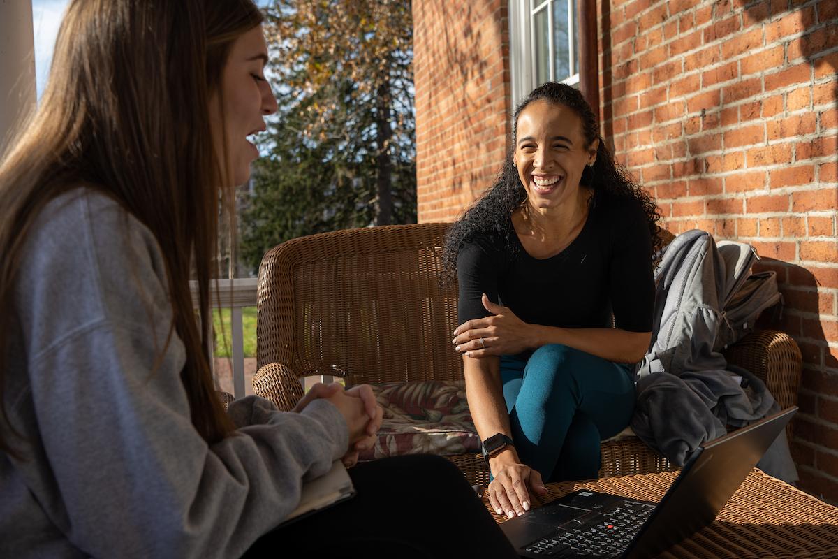 A counselor speaks with a patient
