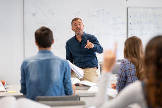 Professor teaching math to a class.