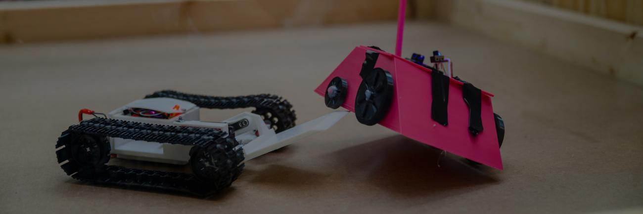 Two Bobcat bots battle