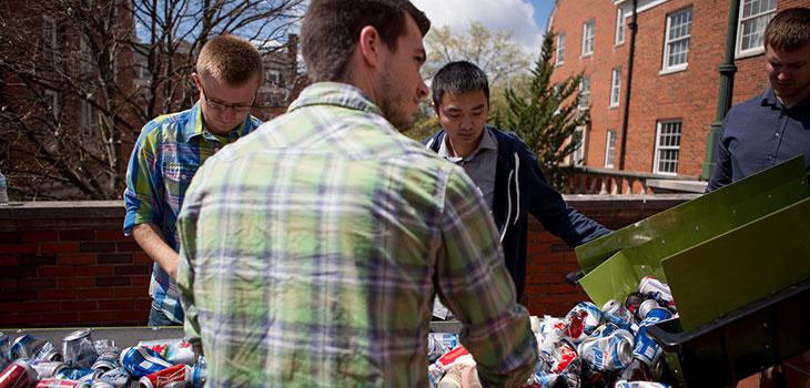 students sort recyclables for senior design project