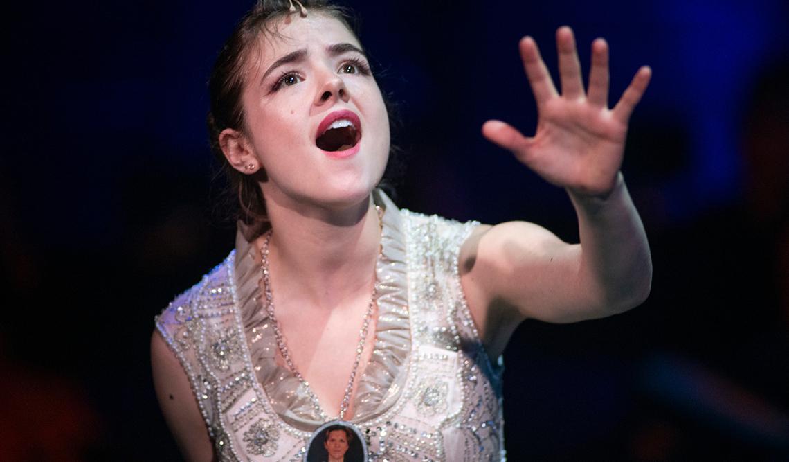 Person singing on stage