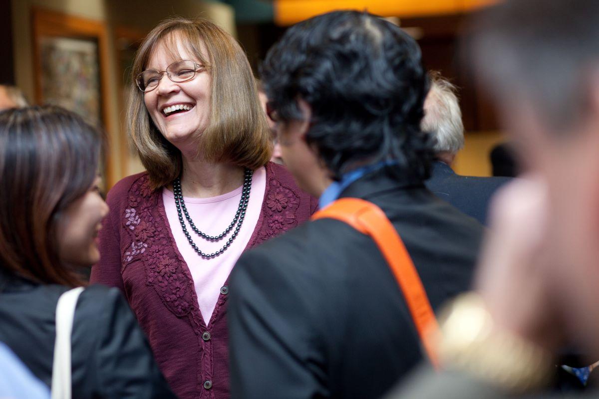 Karen Coshigano, Ph.D., speaking to a group of people
