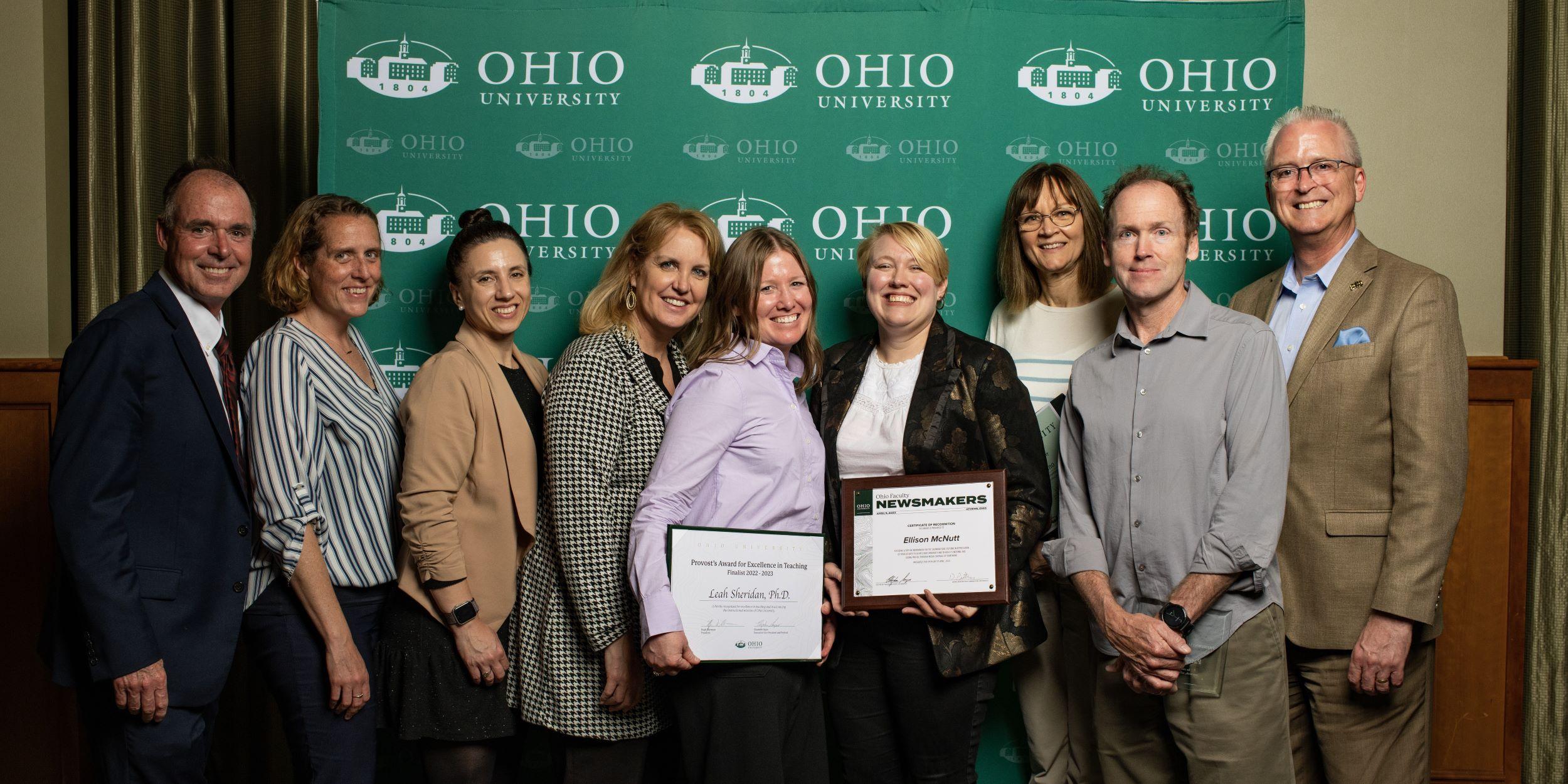 Heritage College faculty pose for a photo at the awards banquet