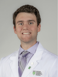 head shot of student in their white coat