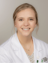 head shot of student in their white coat