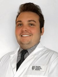 head shot of student in their white coat