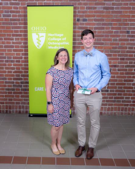 Student Mark Bugada receives student doctor of the year award