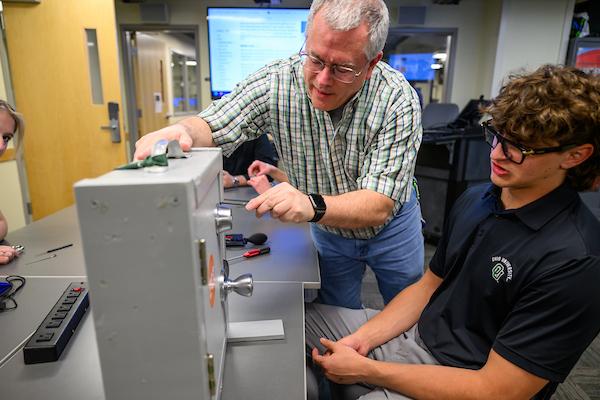 Students and faculty study implications of hands-on physical security for data and information facilities.