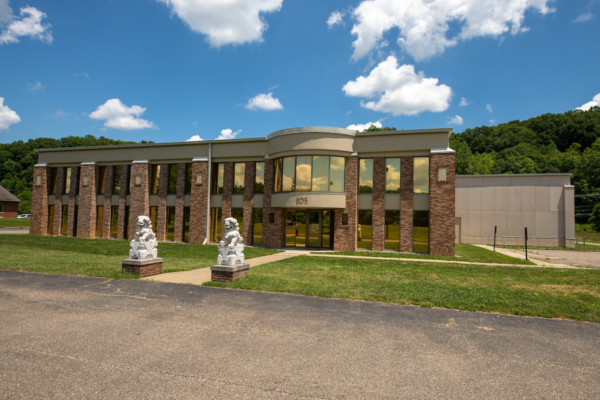 Photo of the Library Annex on a lightly cloudy day