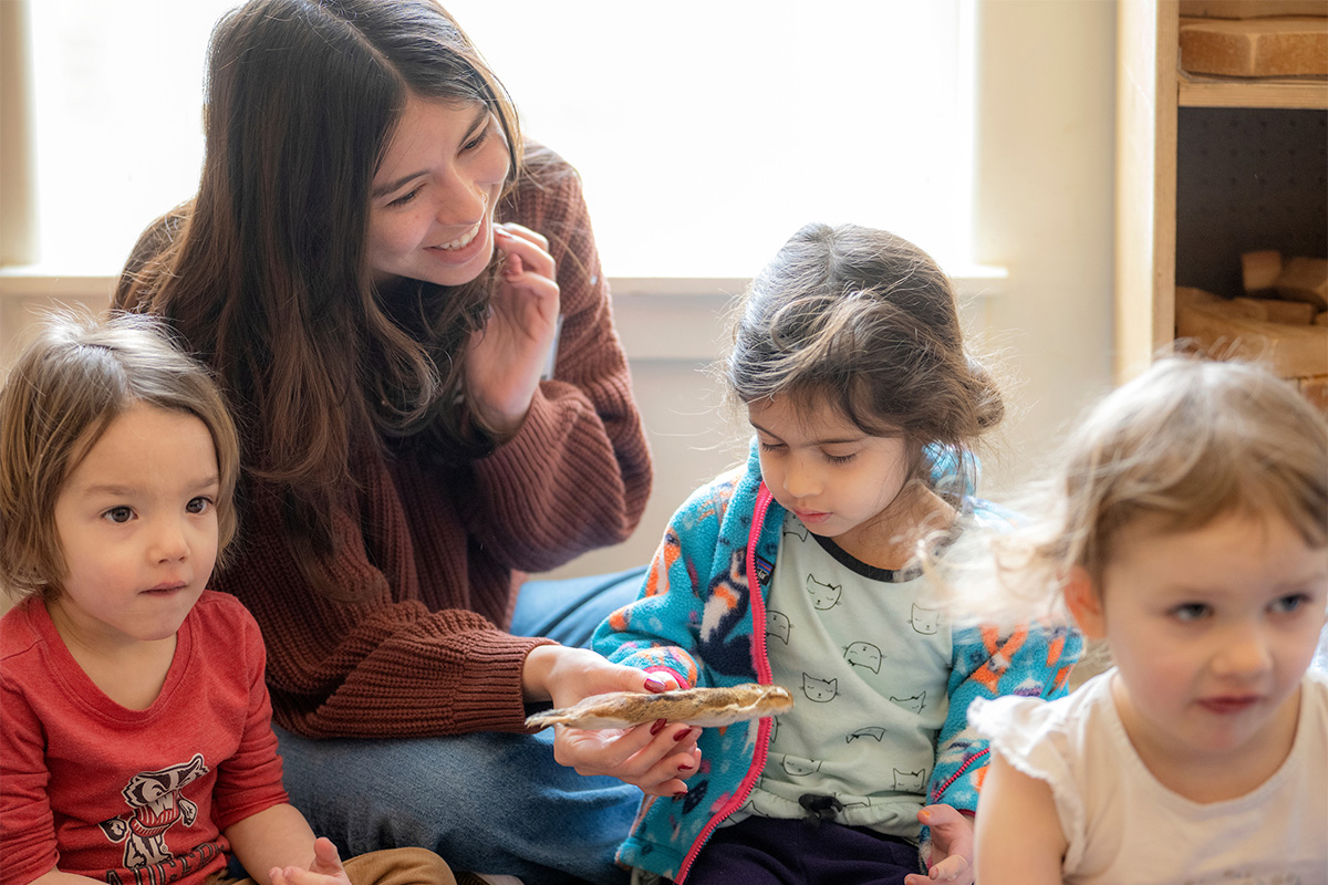 A student works with toddlers at OHIO