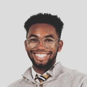 Student smiles for a professional portrait