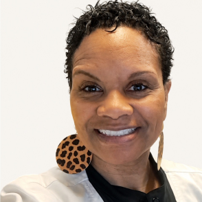 Portrait of graduate Leah Branch smiling, in professional attire