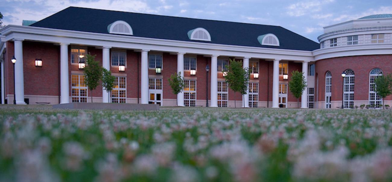 Walter Hall with flowers in the foreground 