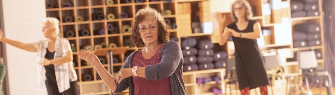 Members practicing Tai Chi in an Active Seniors class
