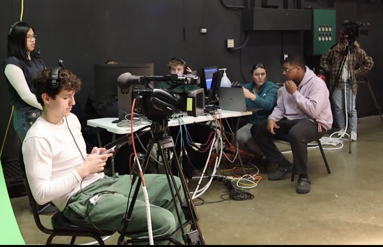 Students in a media arts class shoot video
