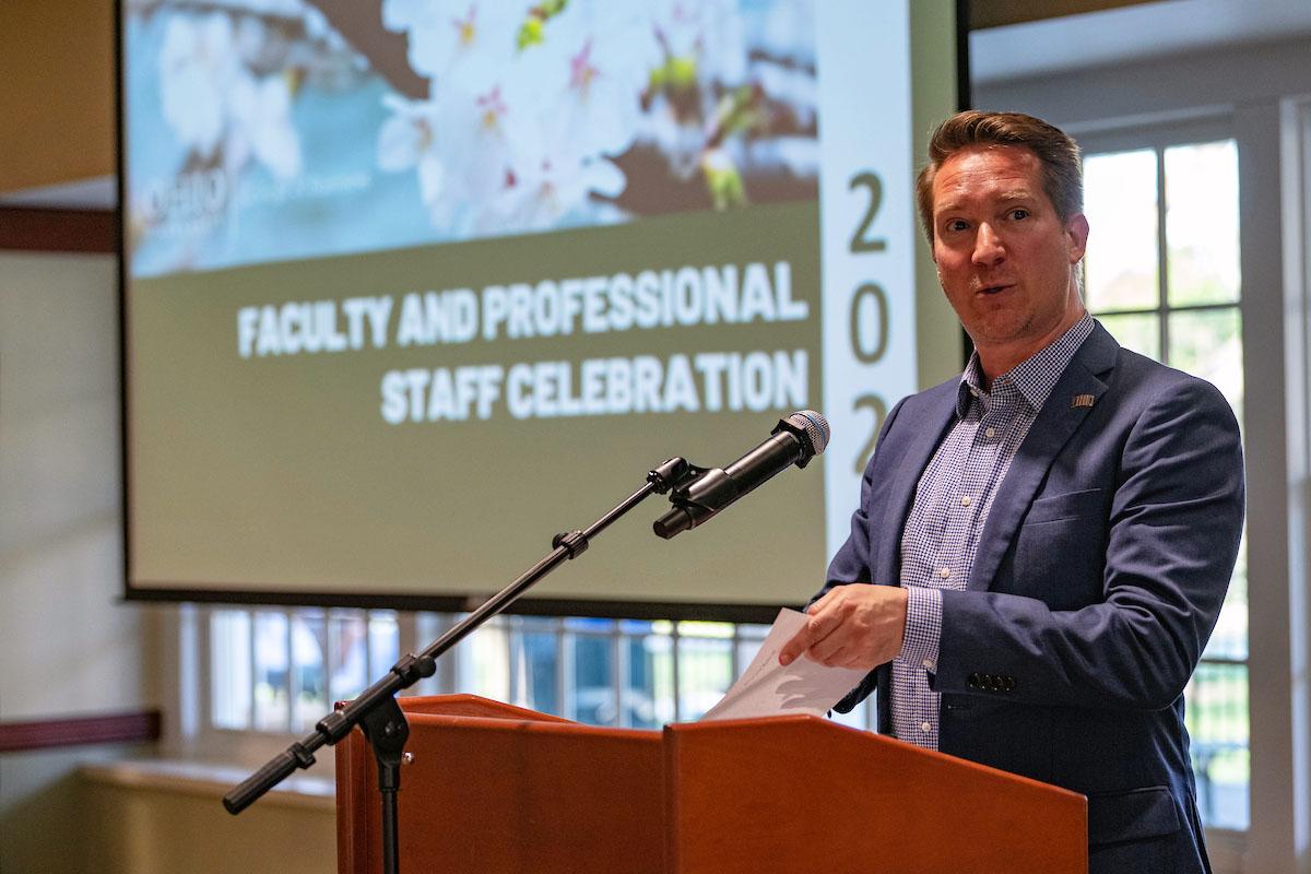 College of Business faculty member addresses the audience at the College of Business Faculty Staff Awards