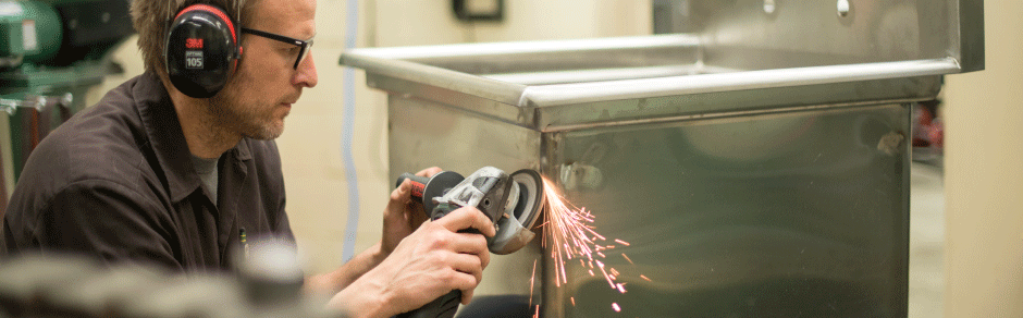 Man grinding steel