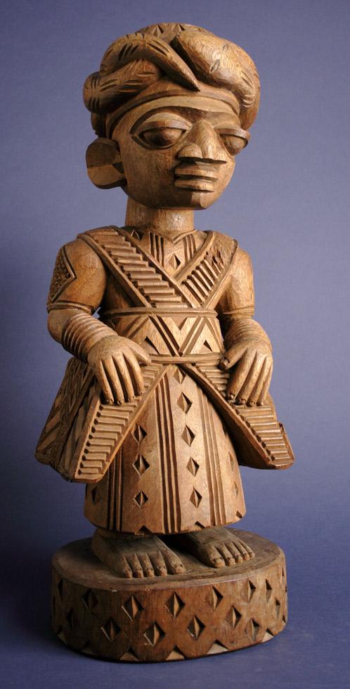 Figure (Medicine Man),  20th c.,  Fakeye Lamidi,  Yoruba, Nigeria,  wood,  22 x 7 x 7.3in ( 55.9 x 17.9 x 18.4cm), 68.062A.B5.