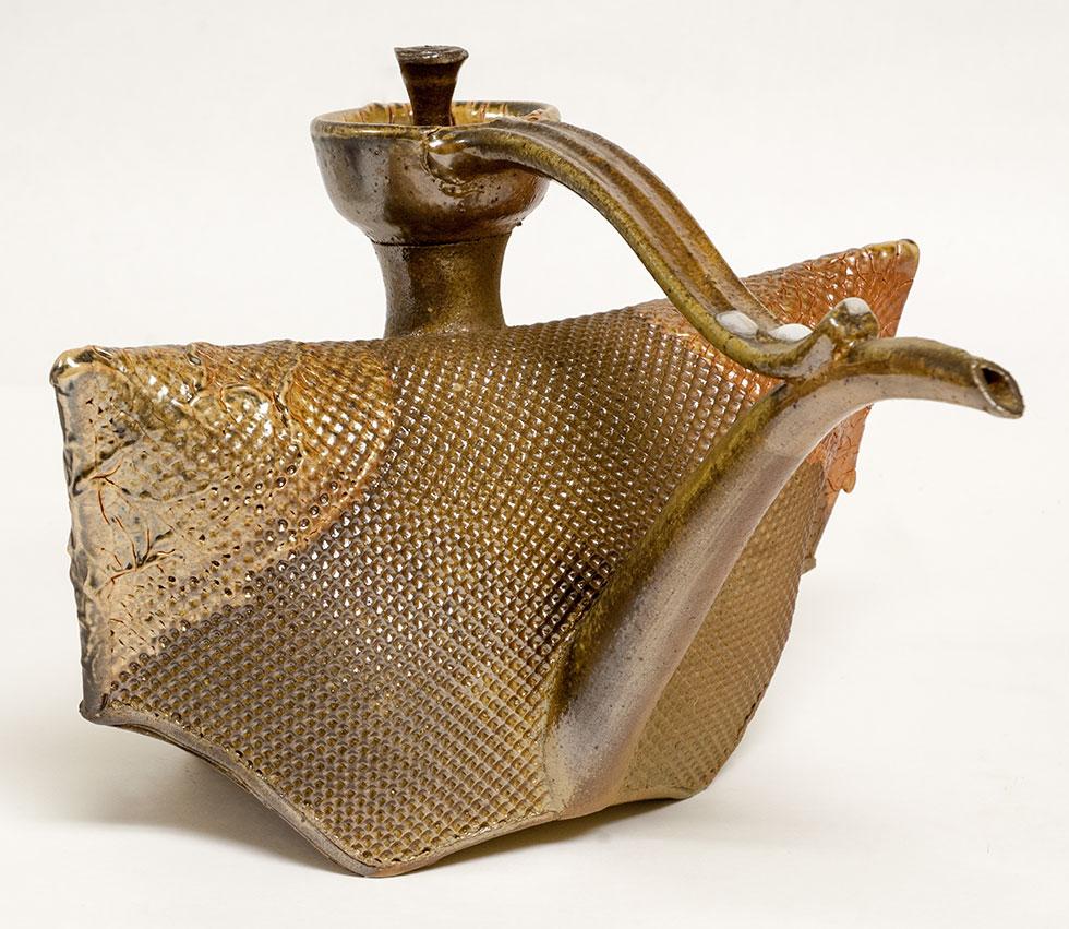 Teapot, 1994, Mike Chipperfield, stoneware and glaze, 8.75 in x 12 in x 12 in (22.2 cm x 30.4 cm x 30.4 cm), 94.018.1. Gift of the artist.