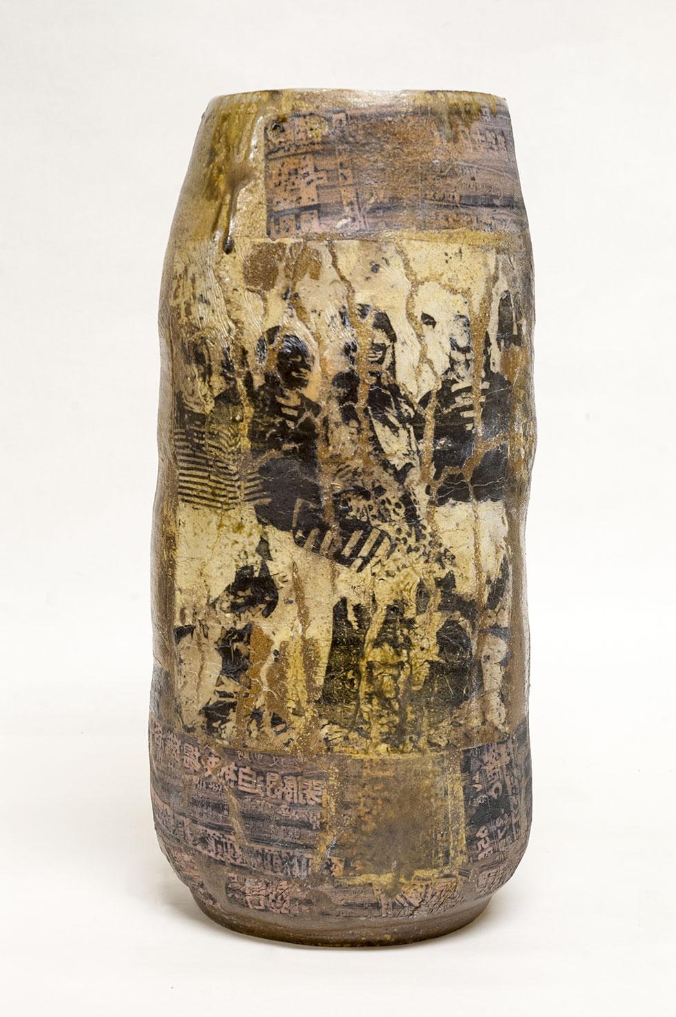 Vessel, 1997, Martin Mohwald, stoneware with xerox transfer and glazes, 16.25 in. x 7.75 in. x 7.5 in. (41.3cm x 19.7cm x 19cm), 97.011.1. Gift of Joe Bova.