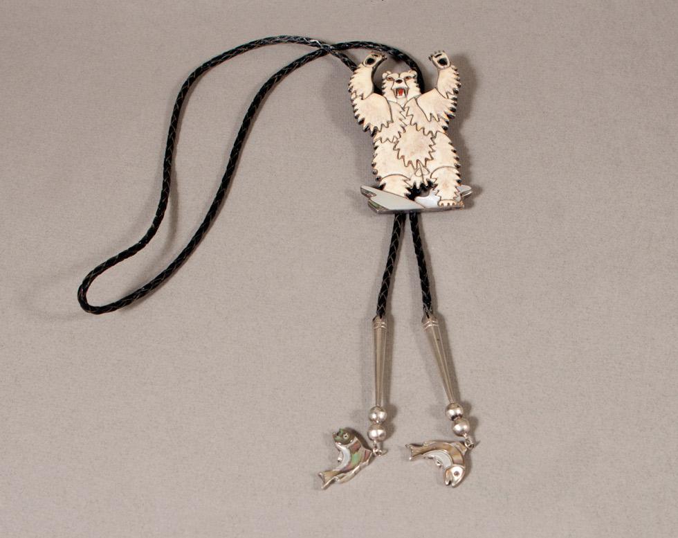 Ivory Polar Bear Bolo, c. 1940, maker unknown, Zuni, 89.016.389. Gift of Edwin L. and Ruth E. Kennedy.