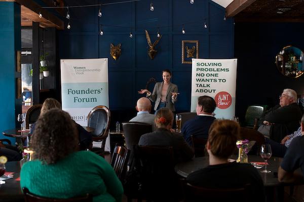 Claire Coder speaking at Athens Uncorked to audience