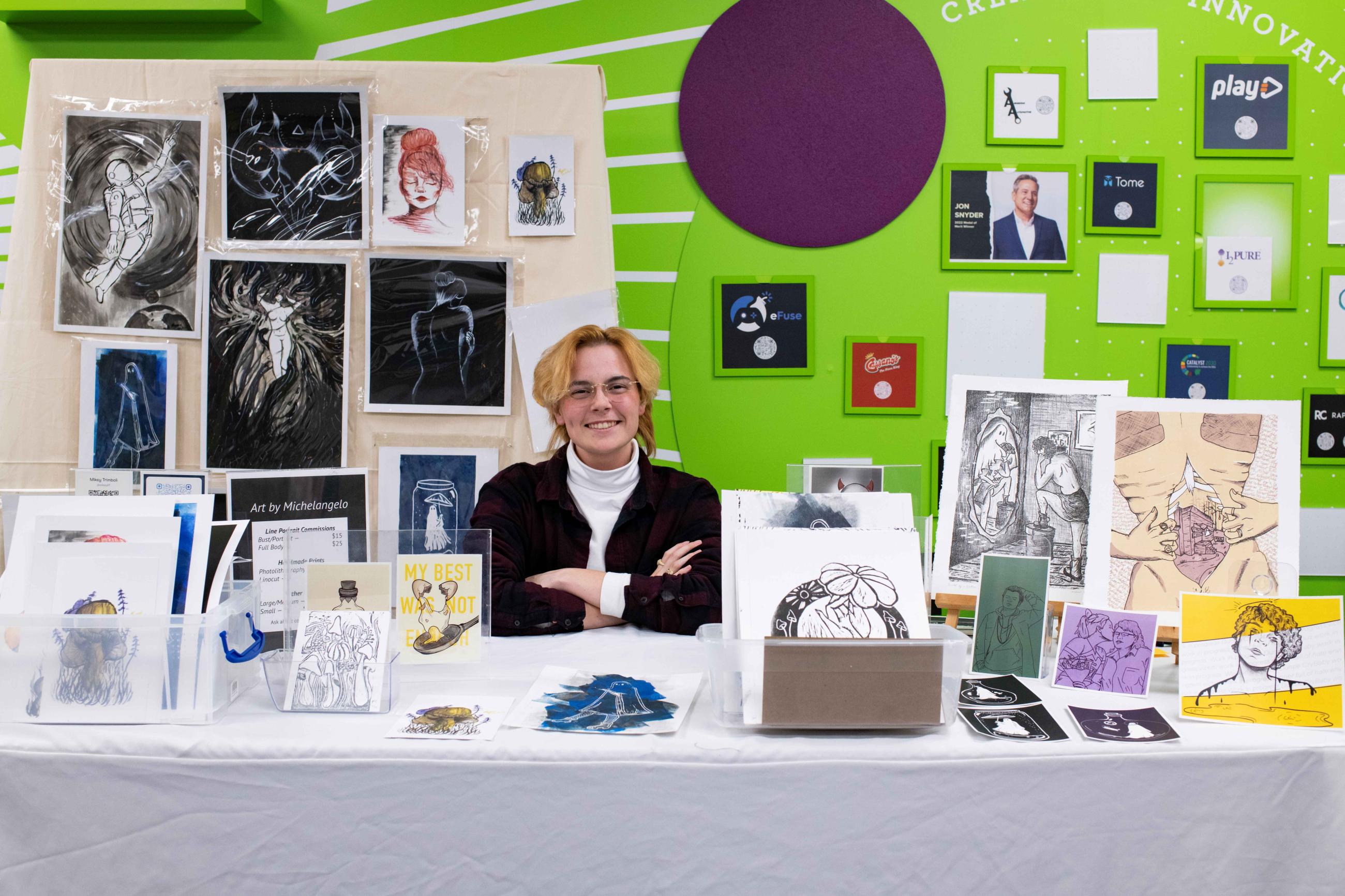 A student displays his art in CoLab.