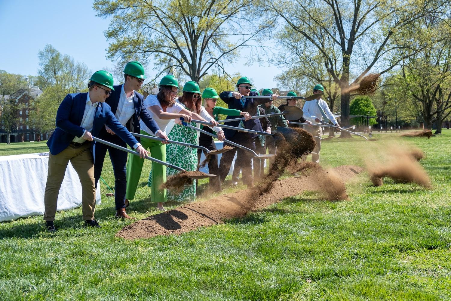 university leadership shoveling ceremonial dirt