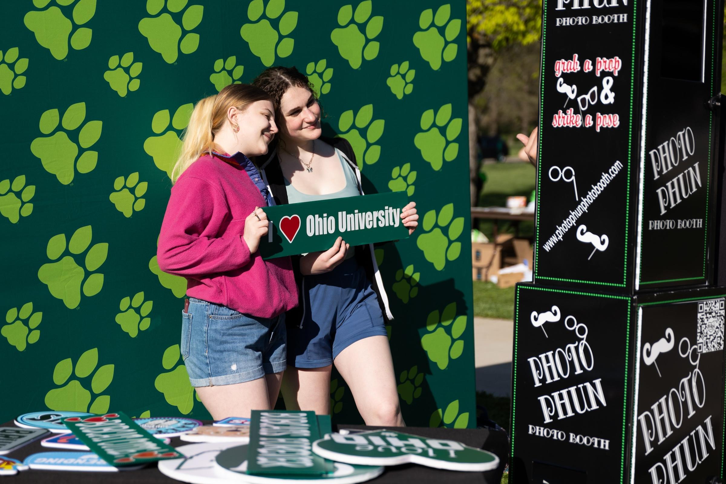 students using the photo booth at the event