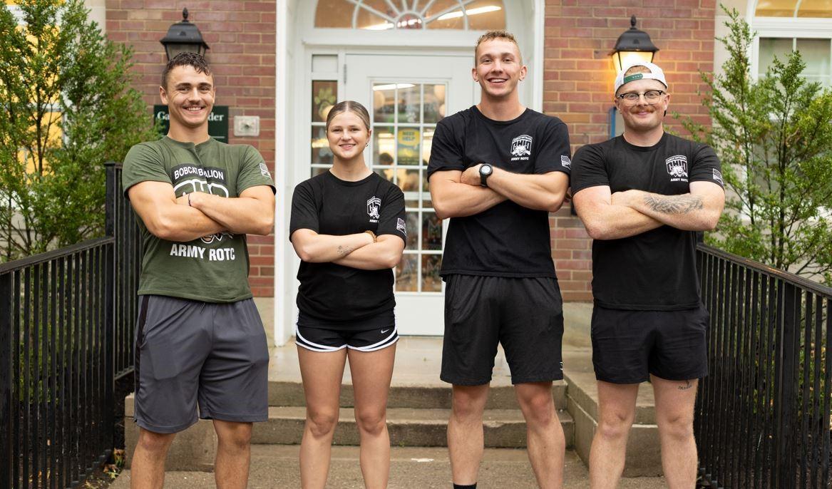 students standing in front of residence hall