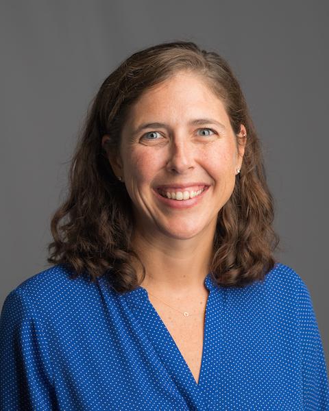 Photo of person wearing blue shirt. 