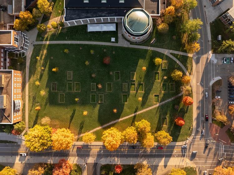 Aerial view of quad of grass on Ohio University campus with fall trees.