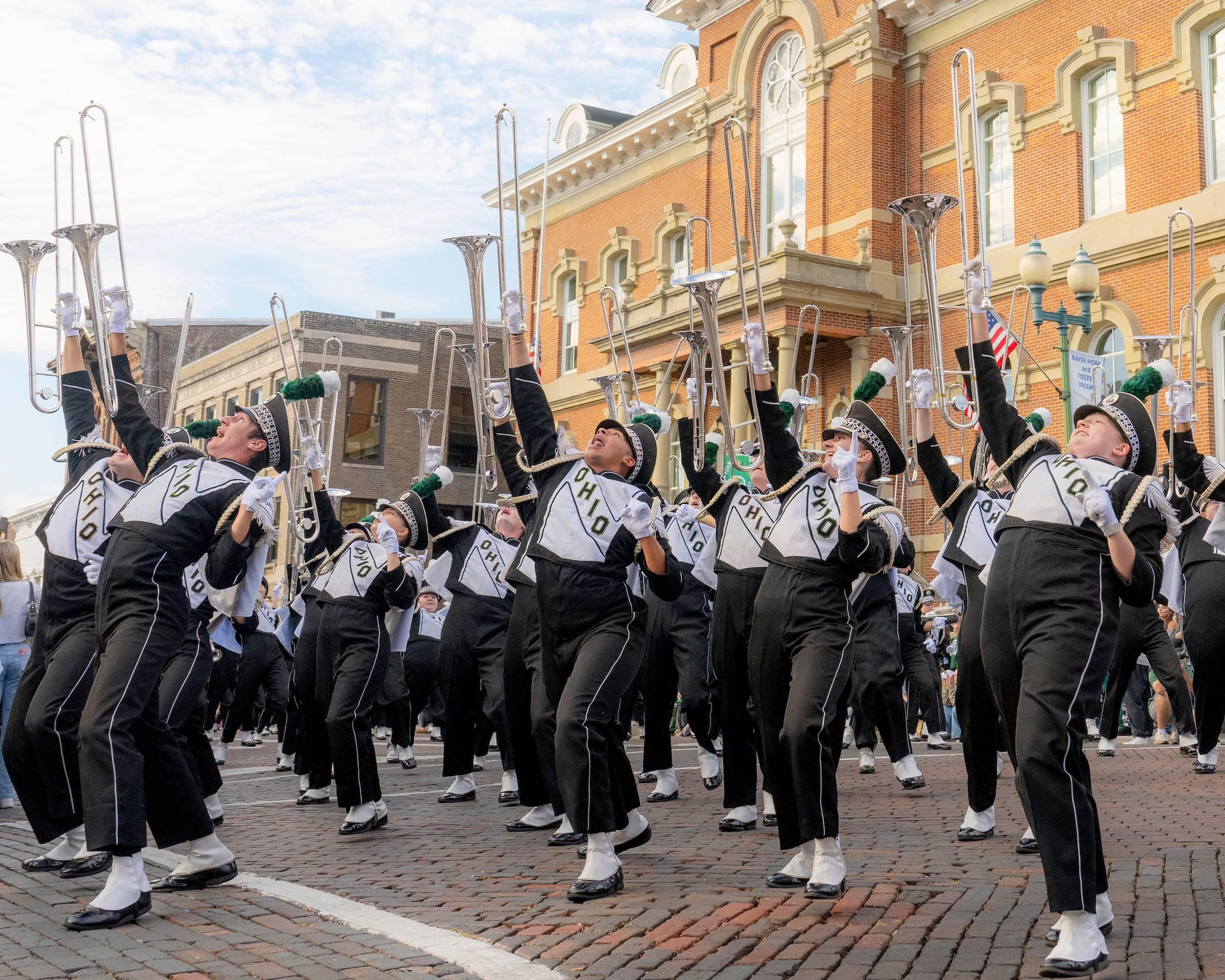 Members of Ohio University's marching band perform in the annual Homecoming parade.