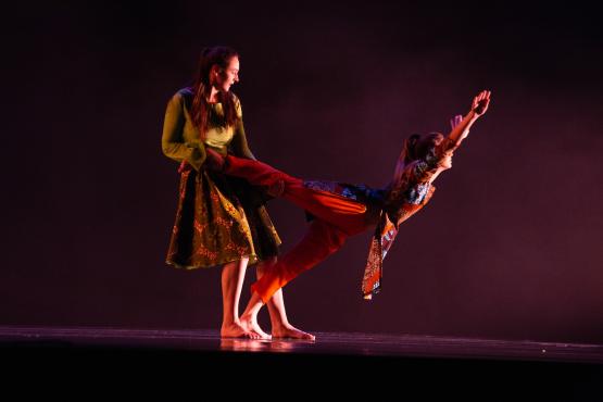 Two dancers mid-performance