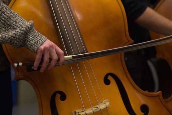 Student playing cello