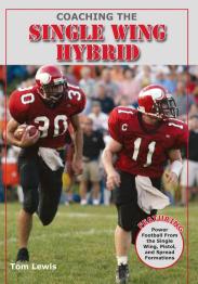 Football players in red uniform running across field.